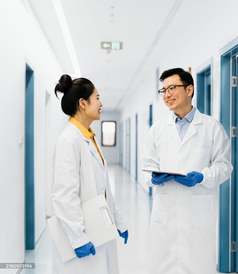 Science Research Laboratory Shot of Two Chinese scientists discussing